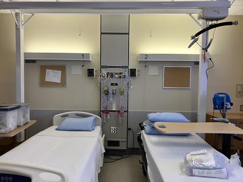 Two beds in the clinical skills lab at St. Paul's Hospital